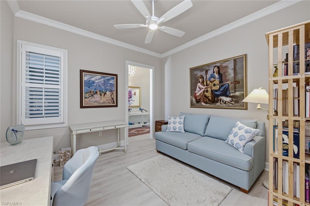 Spacious den offers flexibility as a home office, media room, or additional guest space.