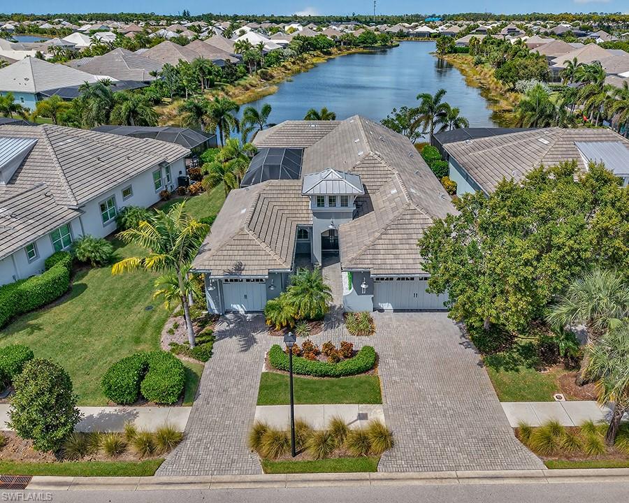 Rare courtyard home offering exceptional privacy and a long northwest-facing lake view.