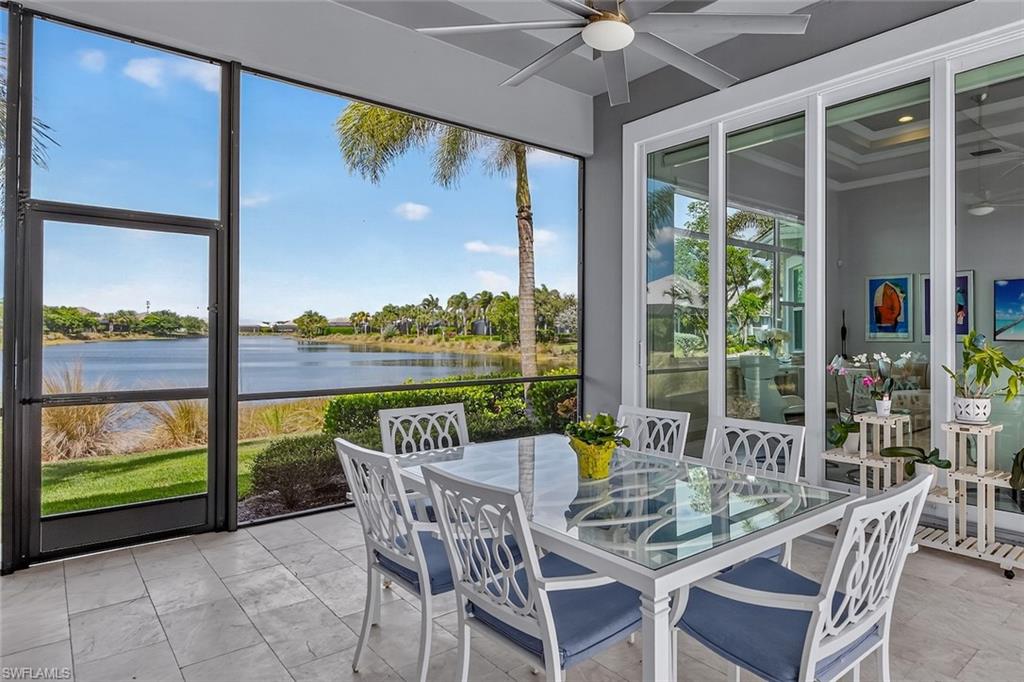 Covered lakeside lanai designed for dining, relaxing, and sunset views.