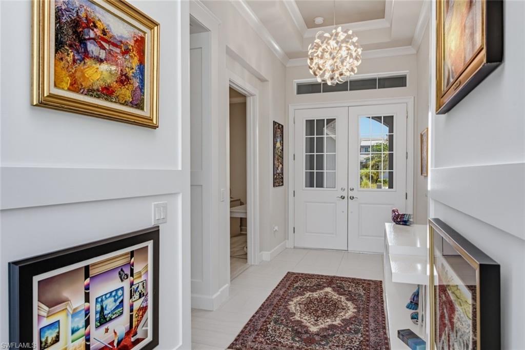 A bright, elegant welcome with soaring ceilings and timeless coastal design.