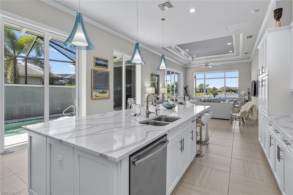 Designed for entertaining with views from the courtyard pool to the lake beyond.