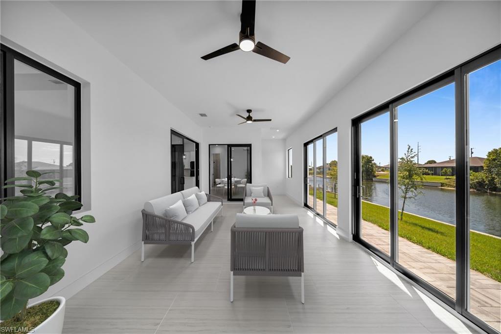 Air-conditioned sun room overlooking the canal.