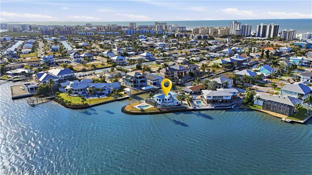 View of urban area with a large body of water and nearby suburban area - Virtually Edited Image