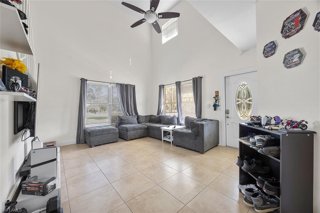 Vaulted ceilings with a ceiling fan overhead