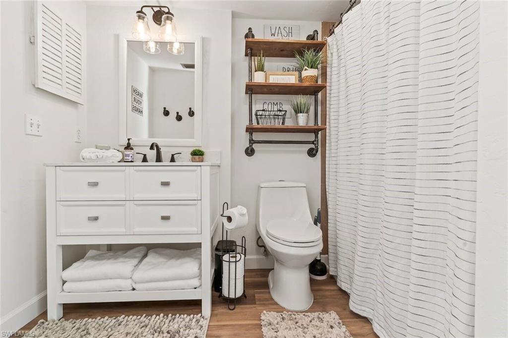 Master Bedroom with balcony view has a bathroom