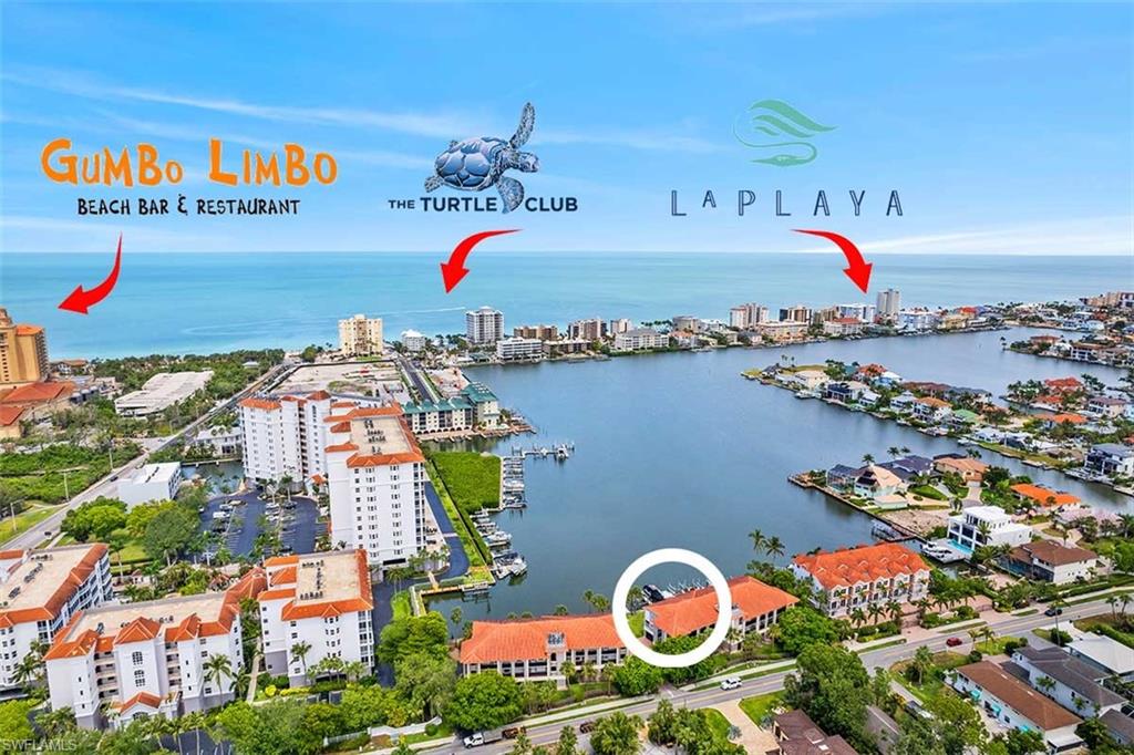 Aerial perspective showcasing waterfront properties and surrounding amenities