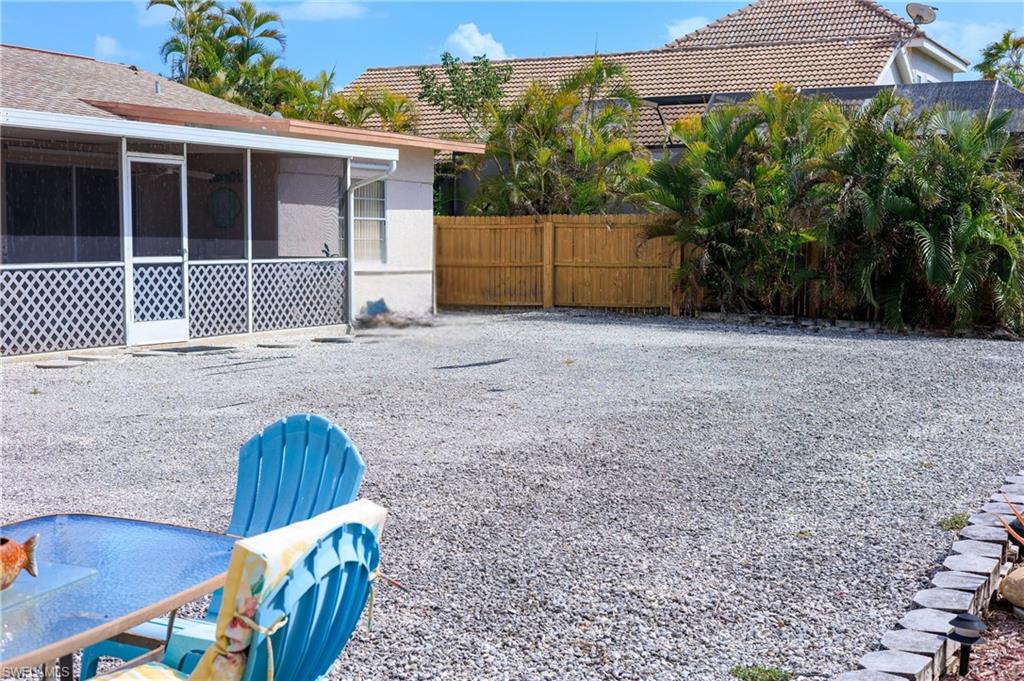 View of yard featuring a sunroom