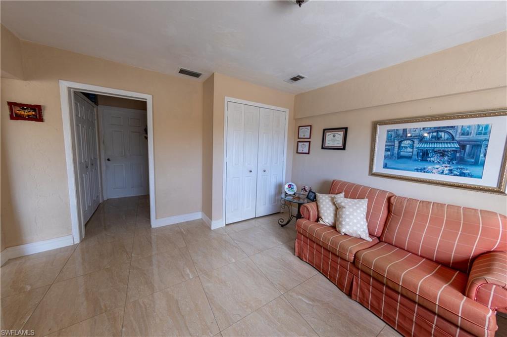 Living area featuring baseboards