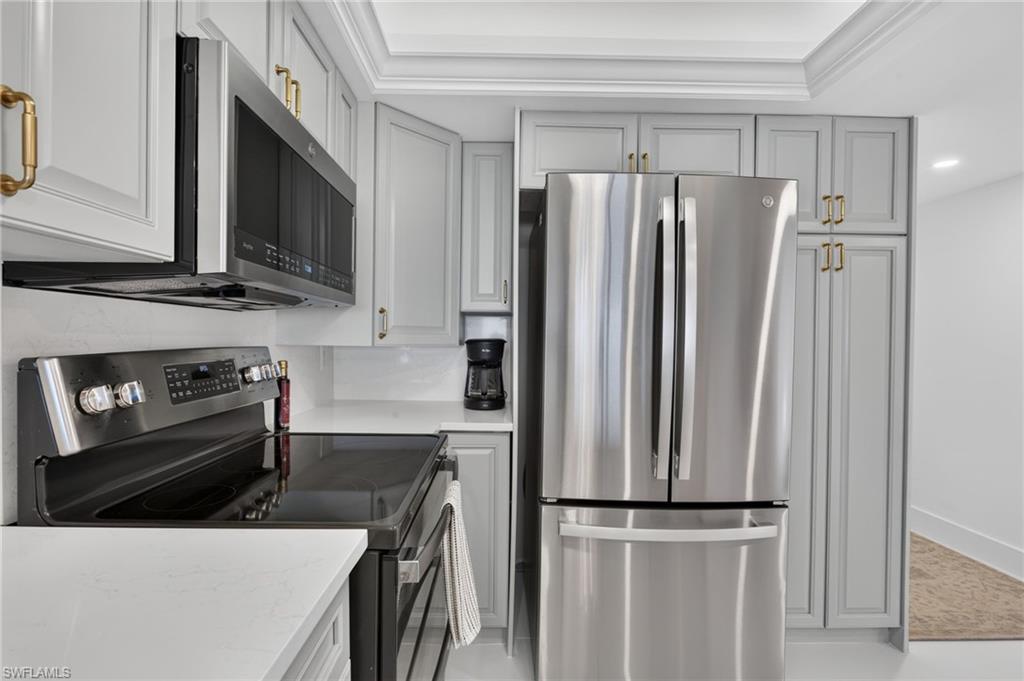 Custom wood cabinetry and pantry, plenty of storage