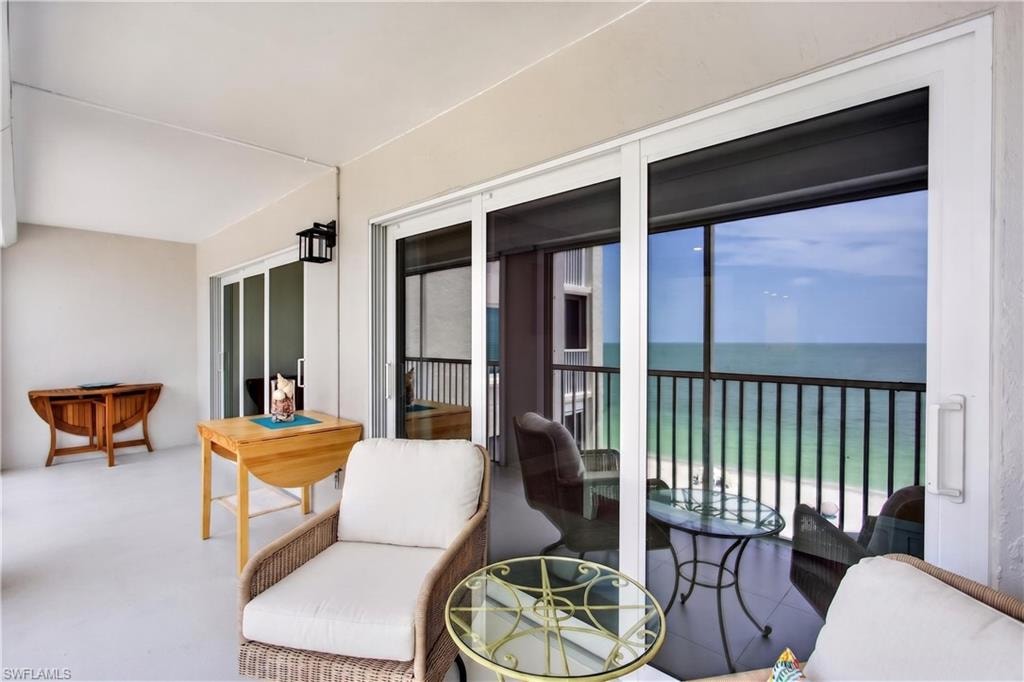 The balcony the width of the condo with entry from both the Great Room and Primary Bedroom. Perfect for enjoying sunsets and dolphins playing!