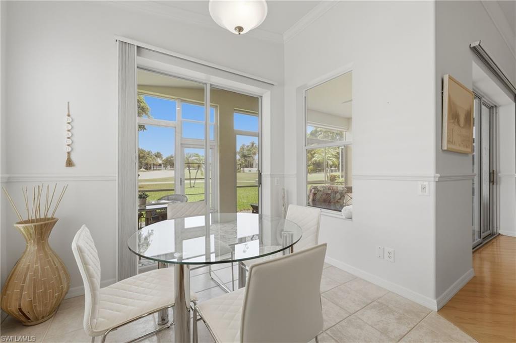 Enjoy serene golf course vistas from the charming breakfast nook, where morning light and picturesque views create the perfect setting for casual dining and relaxed moments.