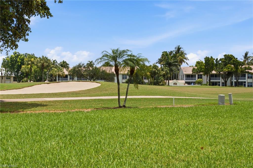 A serene golf course panorama awaits from your private lanai, offering a tranquil outdoor retreat where you can relax, unwind, and enjoy the beauty of the surrounding landscape.