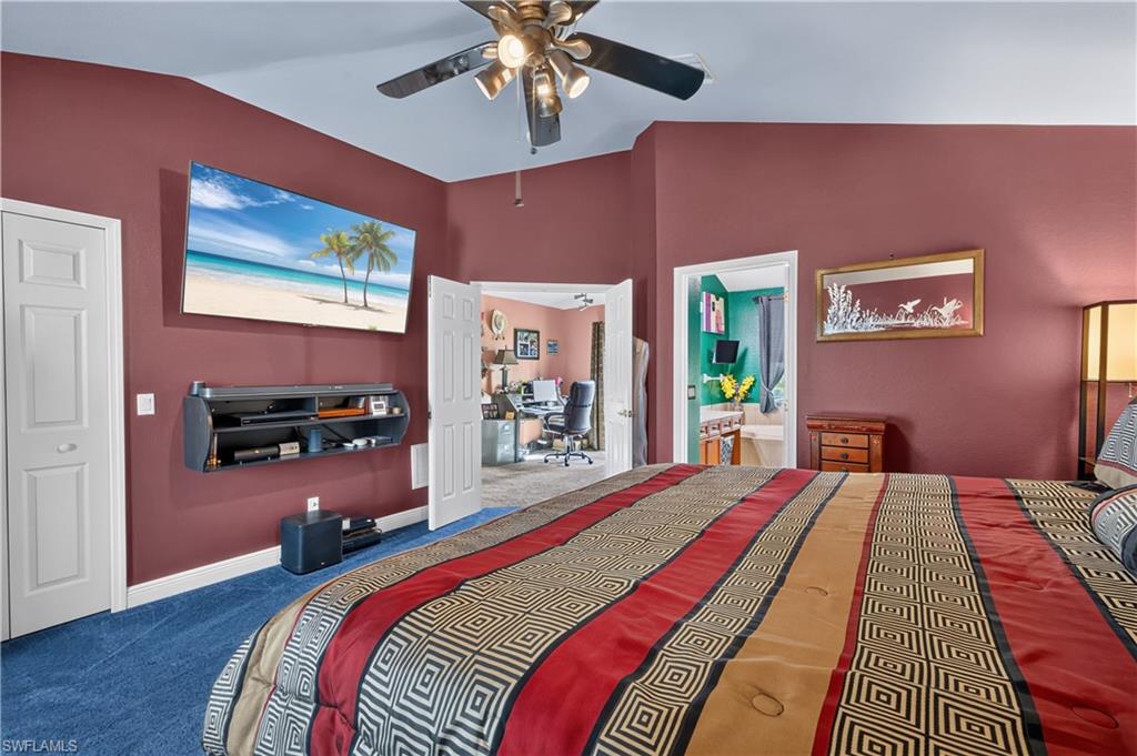 Vaulted ceiling with a ceiling fan