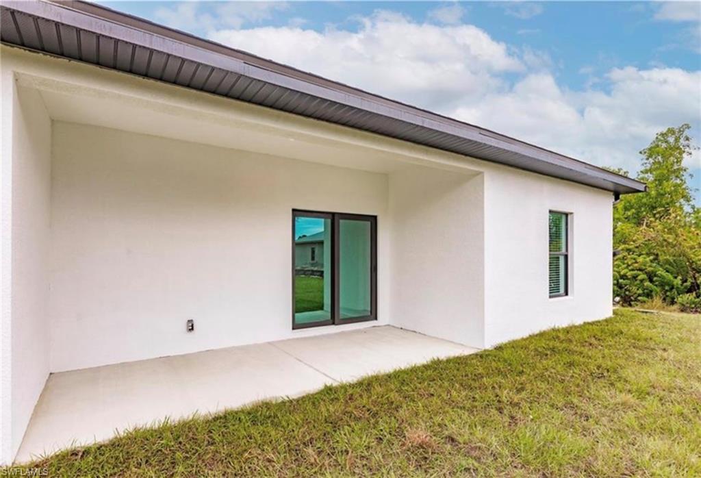 Rear exterior with covered patio