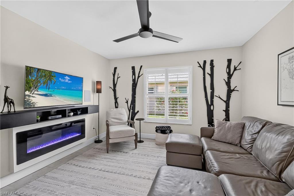 Den with fireplace for ambience or those couple of chilly nights.