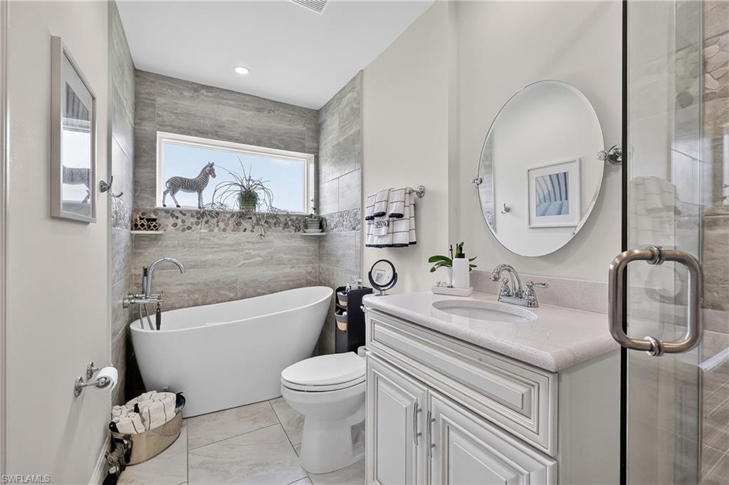 Primary Bathroom with soaking tub and separate shower