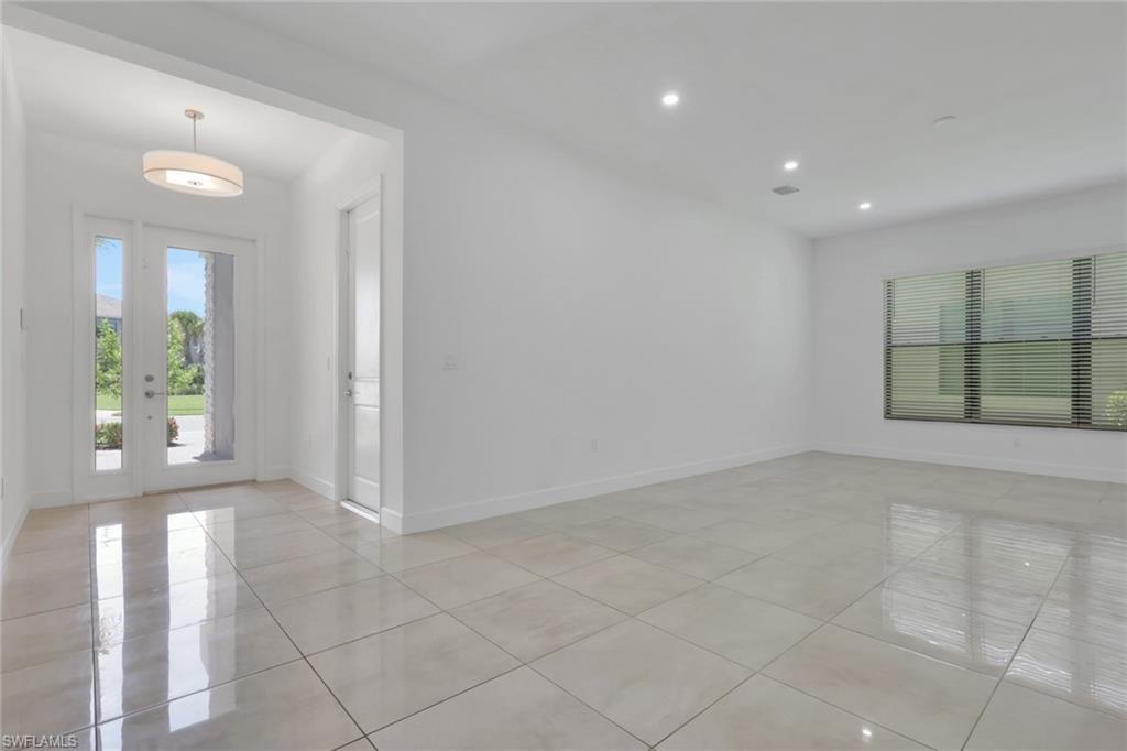 Entryway opens into large flex room ideal as living room, playroom or office.