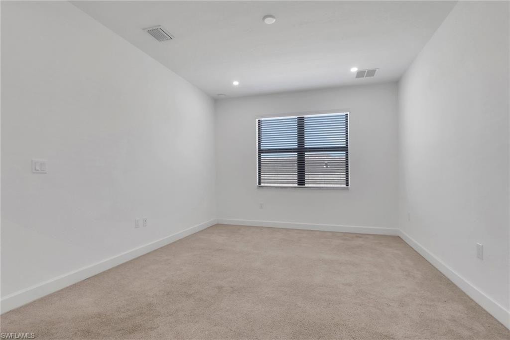 2nd bedroom is ensuite with walk-in closet and private bath.