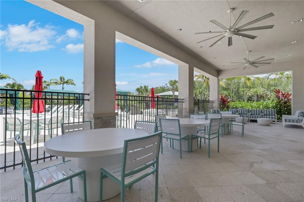 Ourdoor patio overlooking pool.