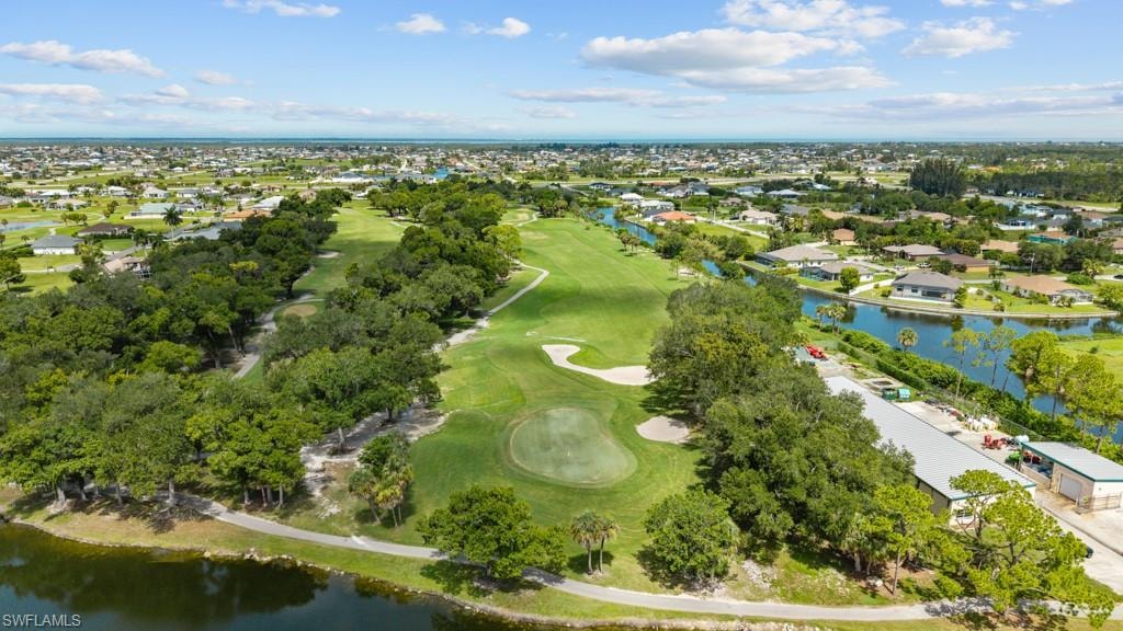 Expansive golf course frontage with manicured greens and sand traps