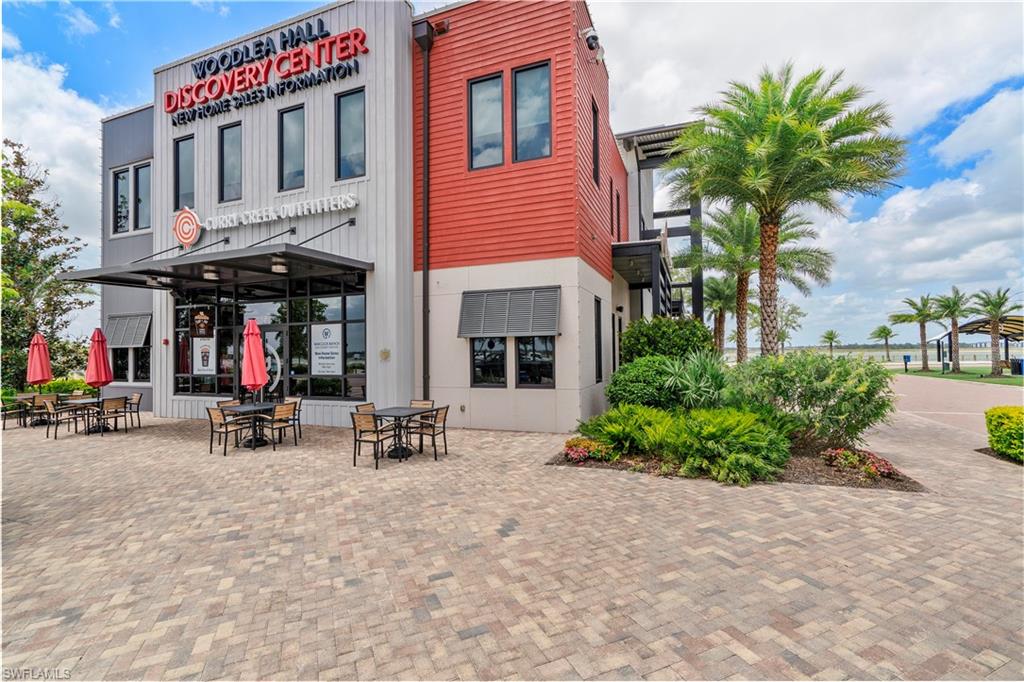 Contemporary commercial building with contrasting red and grey facades