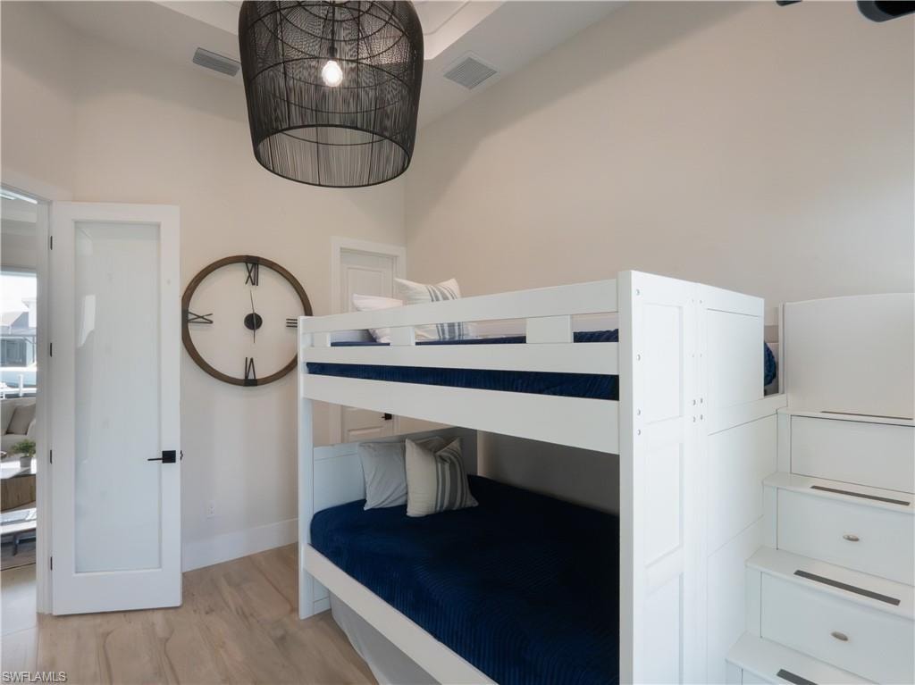 Wood-finish flooring with light-toned walls