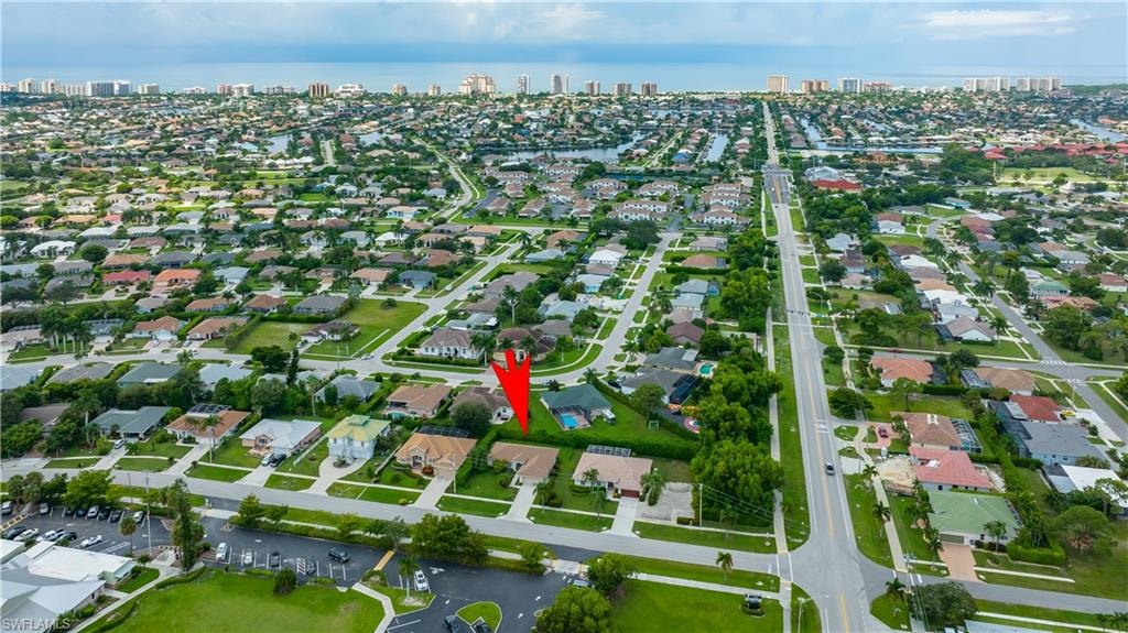 Expansive neighborhood featuring a grid of residential properties and roadways