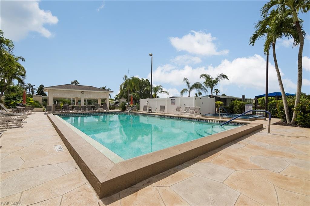 Outdoor swimming pool with concrete decking
