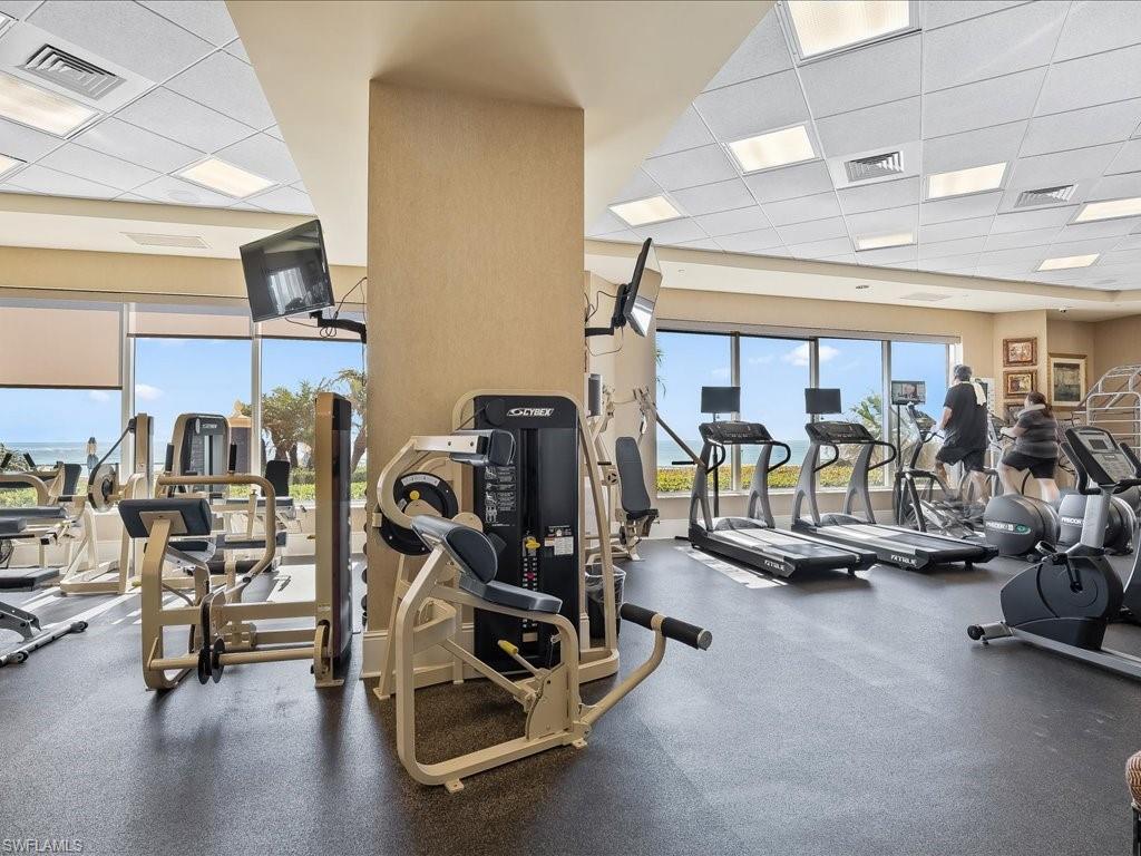 Workout area featuring a paneled ceiling