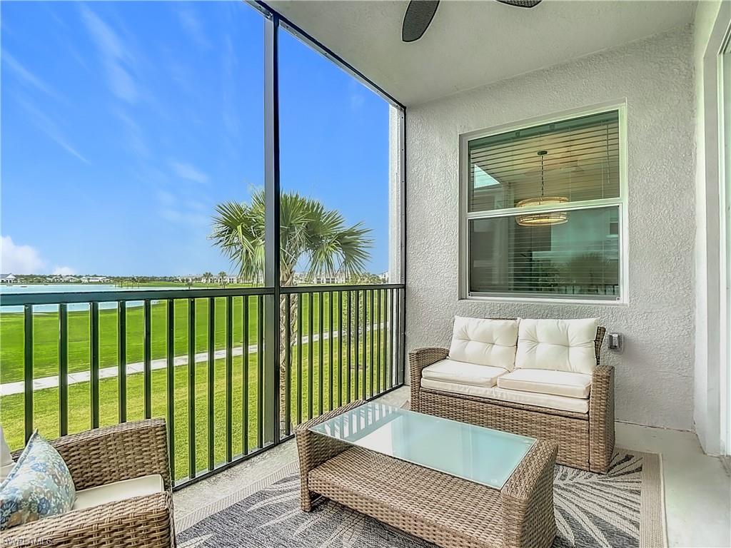 Sunroom with a ceiling fan