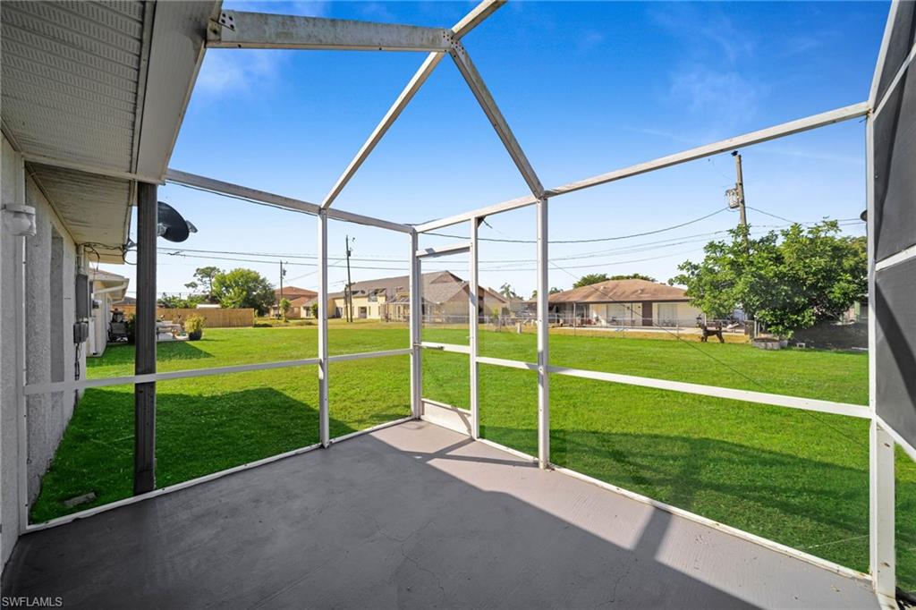 Screened patio with concrete flooring