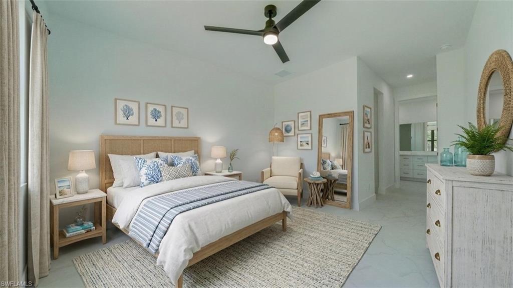 Primary bedroom features 2 walk-in closets and en-suite. (Virtually staged)