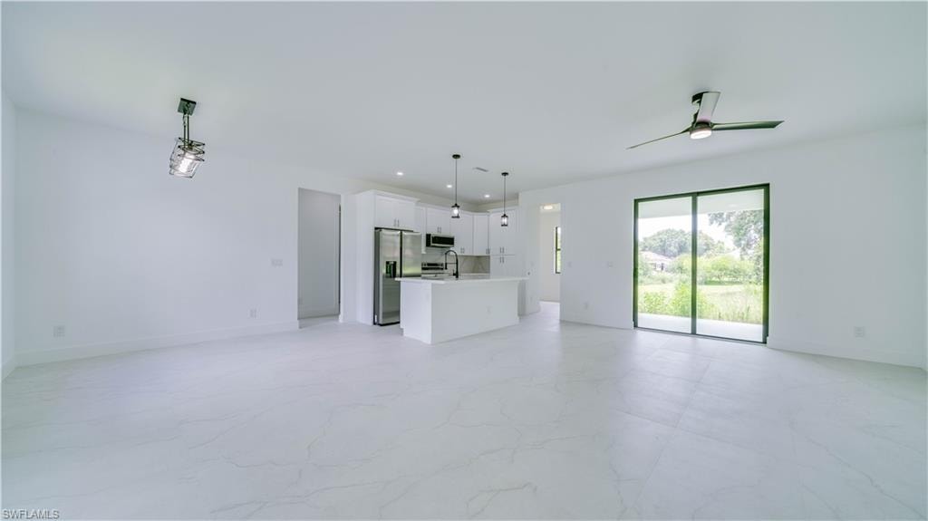 Light & Airy with upgraded light fixtures throughout!