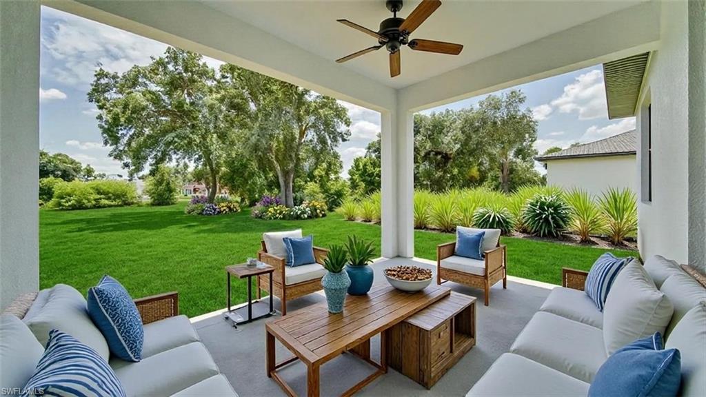 Covered lanai offers room to relax and/or entertain! (Virtually Staged)