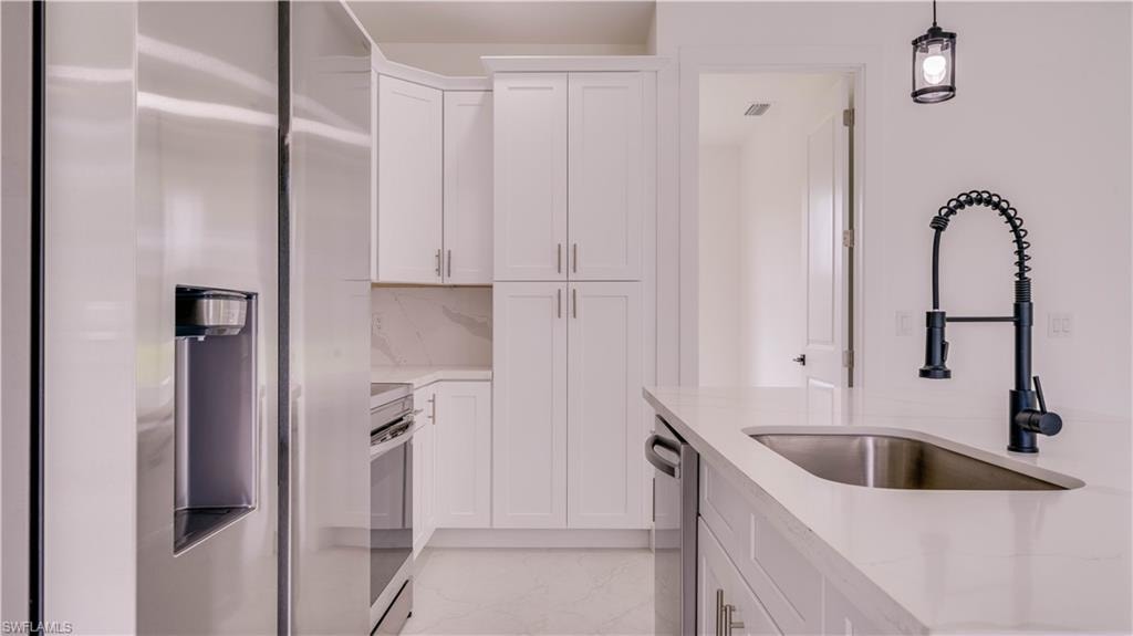 High end Samsung Stainless Steel appliances. Built in Pantry!