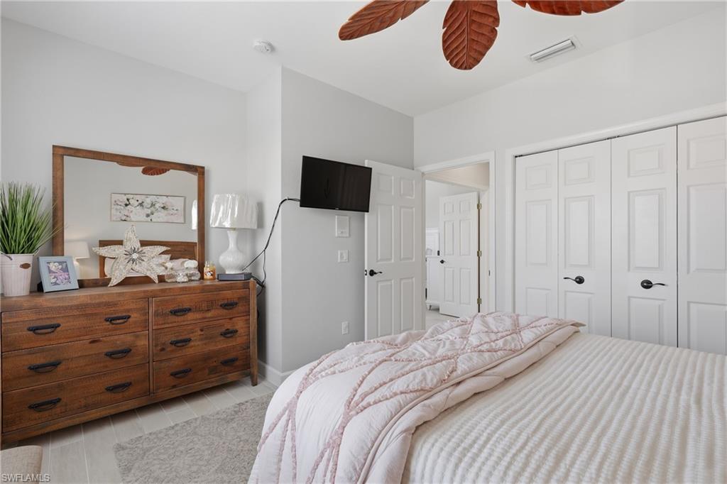 Bright interior space featuring light gray walls and white trim
