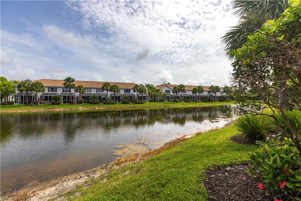 Water view featuring nearby suburban area