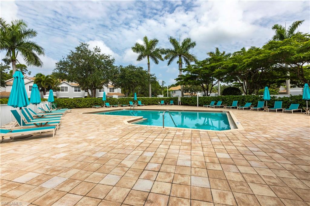 Community pool featuring a patio area