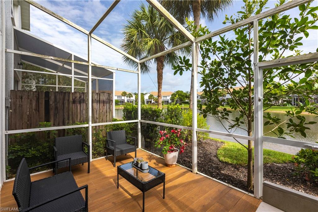 Sunroom with a water view