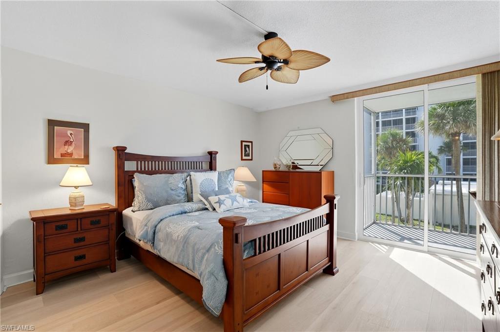 Light wood-finish flooring complements the neutral wall tones