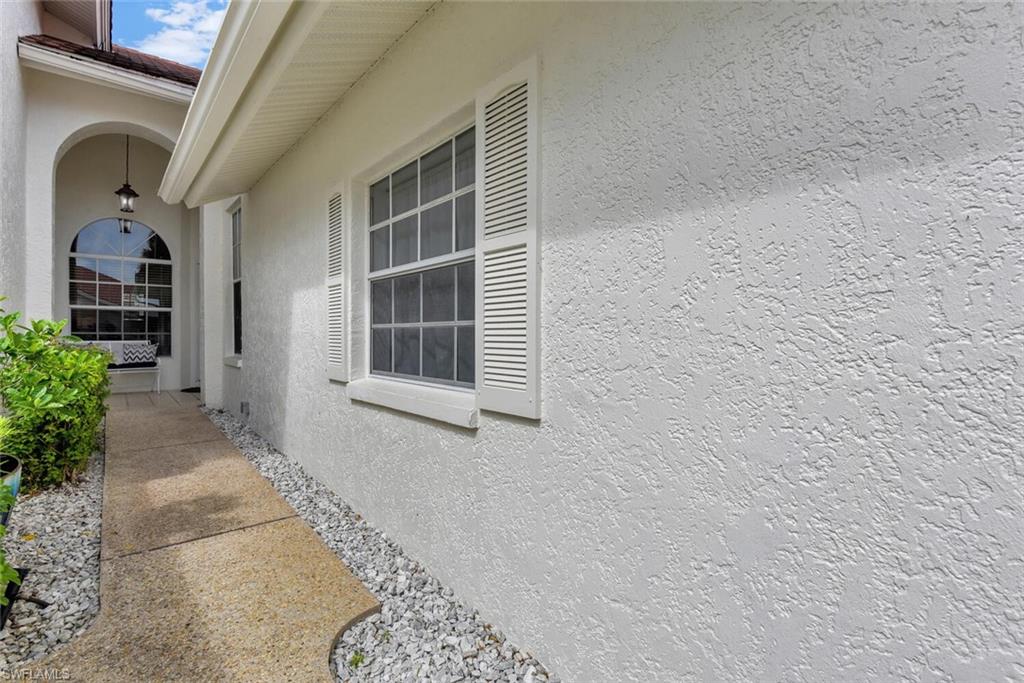View of home's exterior featuring stucco siding