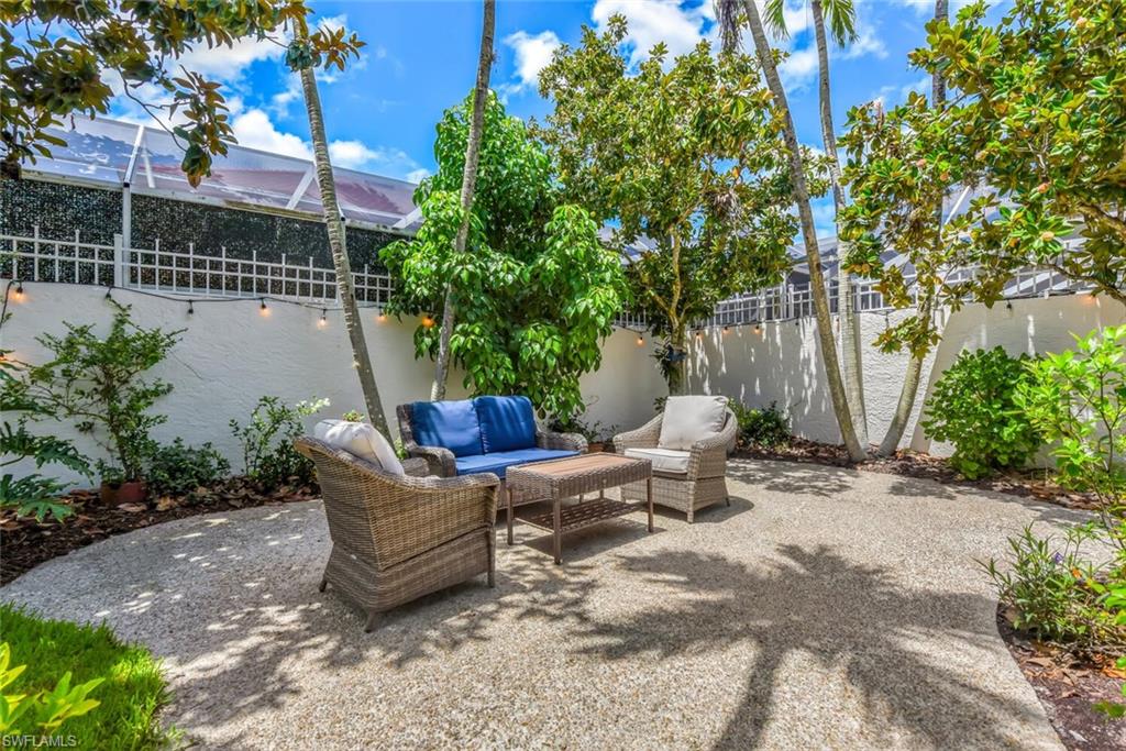 Fenced backyard featuring outdoor lounge area and a patio area
