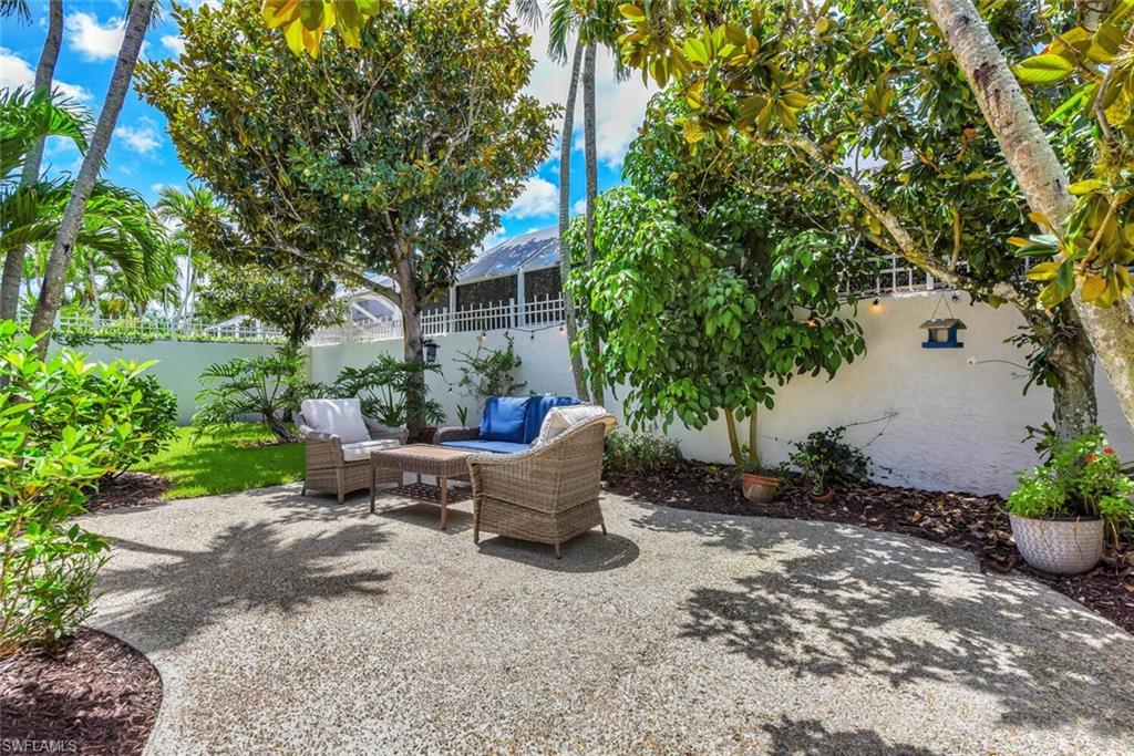 Fenced backyard with a patio area
