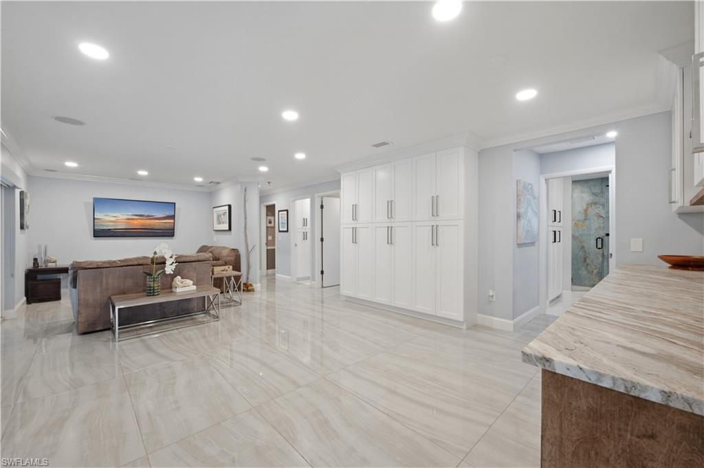 oversized entertainment space with guest bath