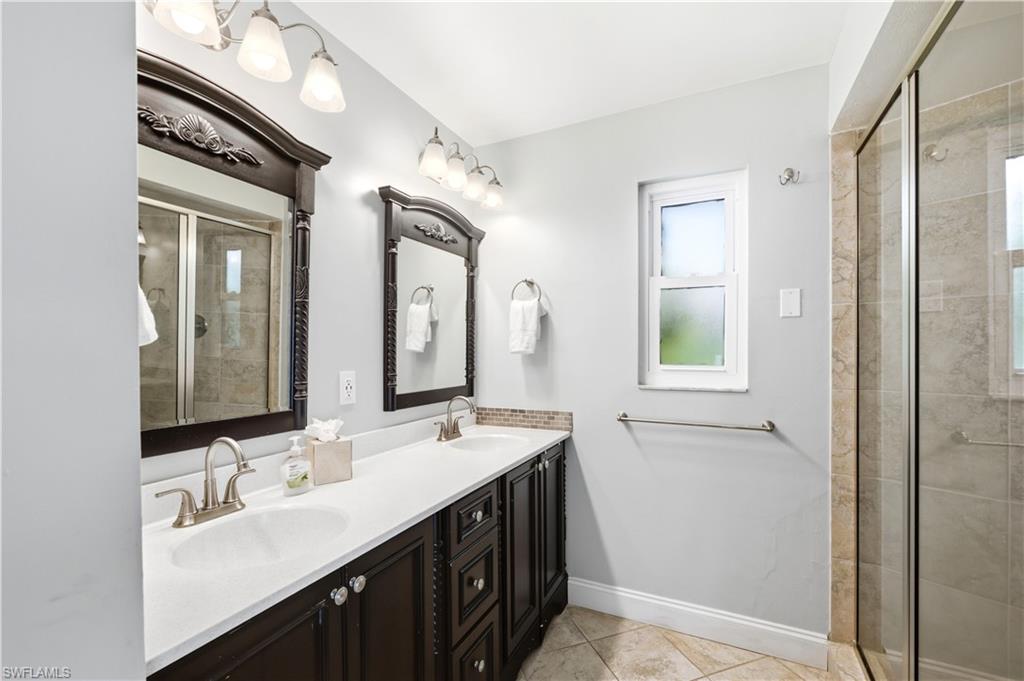 primary bath walk in shower dual sinks