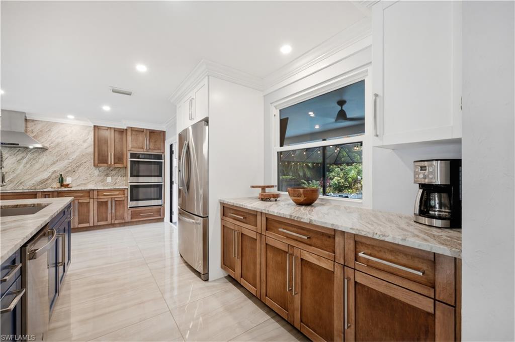 kitchen with window to pool area