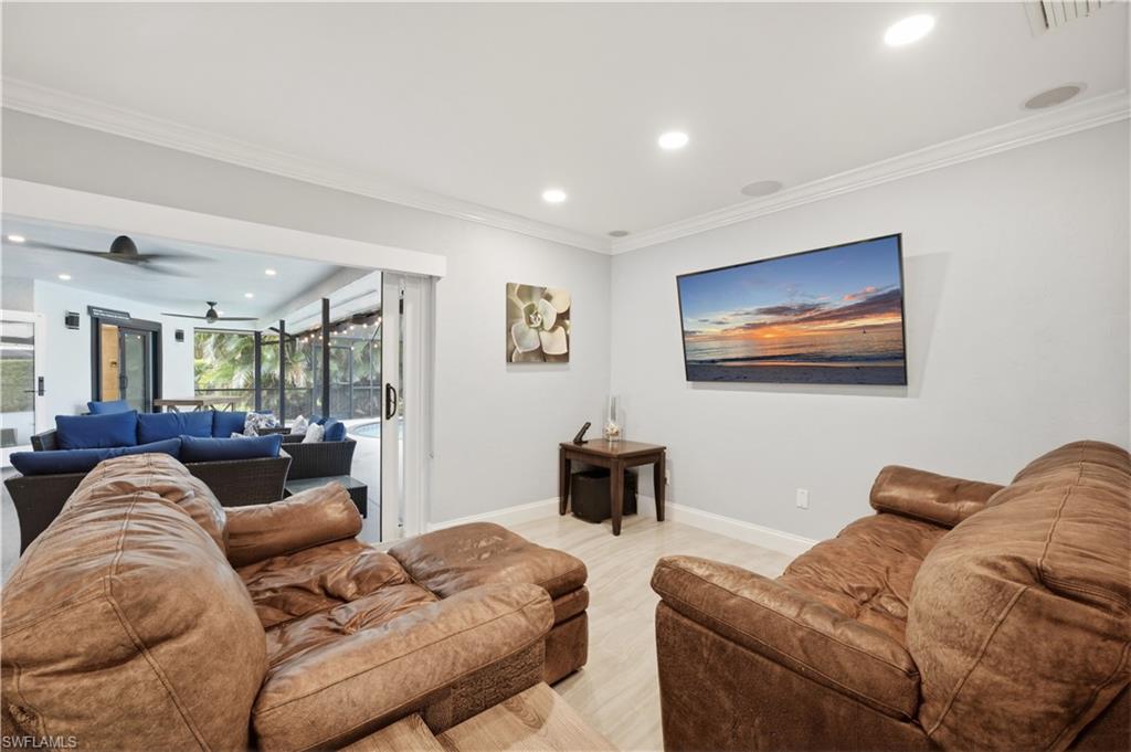 casual tv room off pool