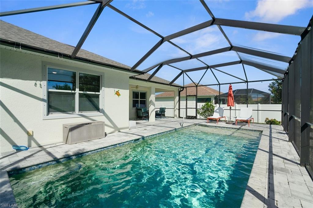 View of pool and lanai seating area