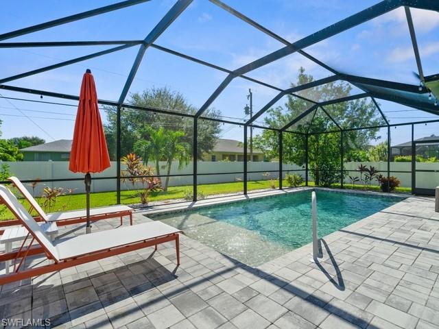 View of swimming pool lounging area