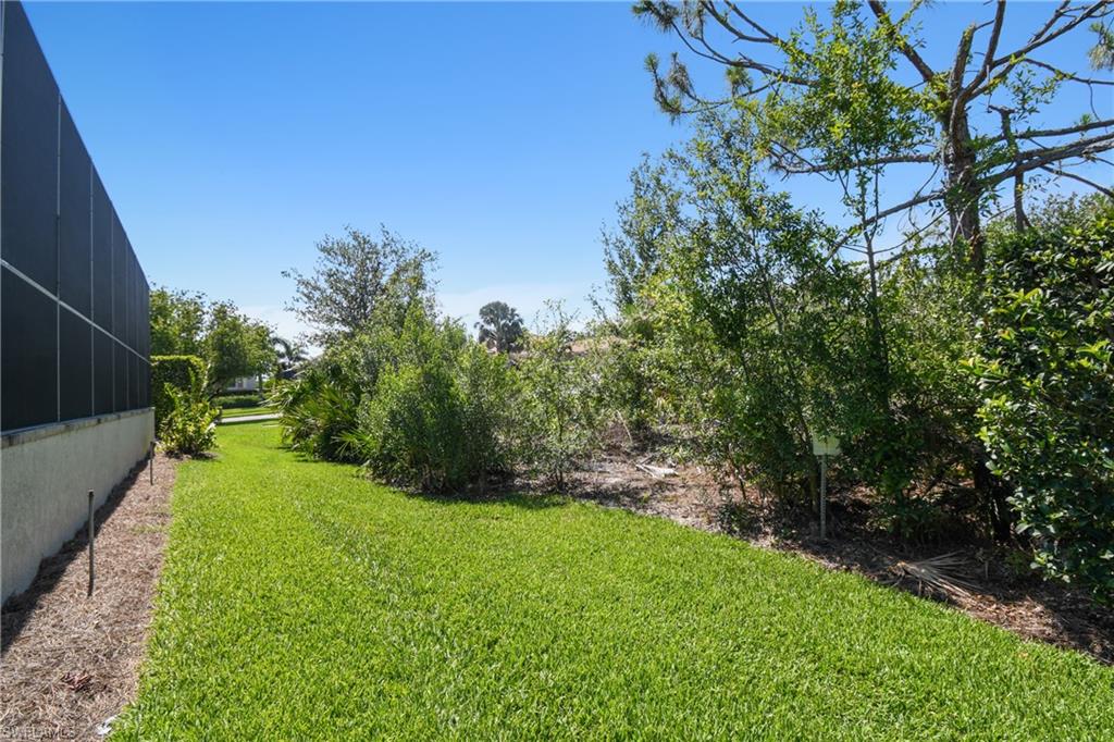 Expansive green lawn with established landscaping